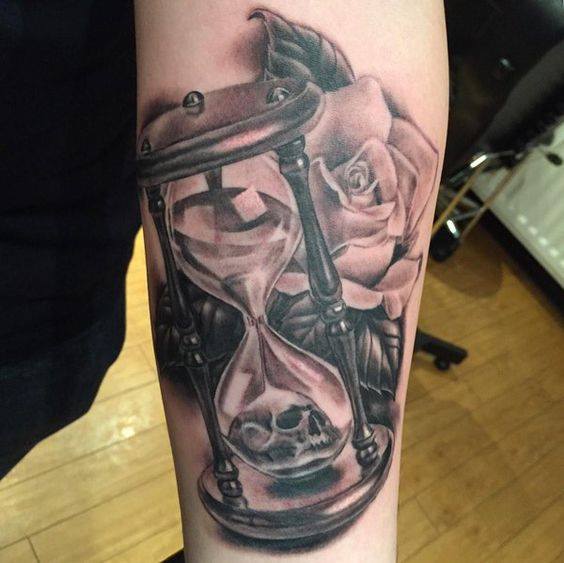 Grey Rose and Skull In Hourglass Tattoo On sleeve