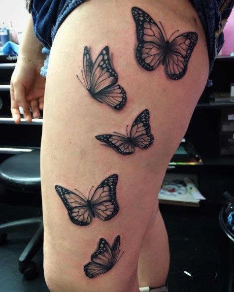 Group Of Black And gray Butterfly Tattoo On Thigh And Leg