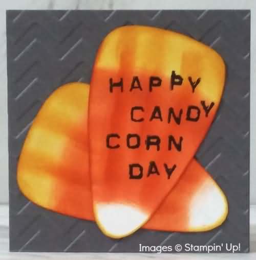 Happy Candy Corn Day Text Written On Candy Corn