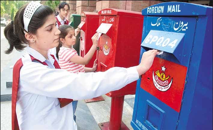 Happy World Post Day Girls Posting Cards In Post Box