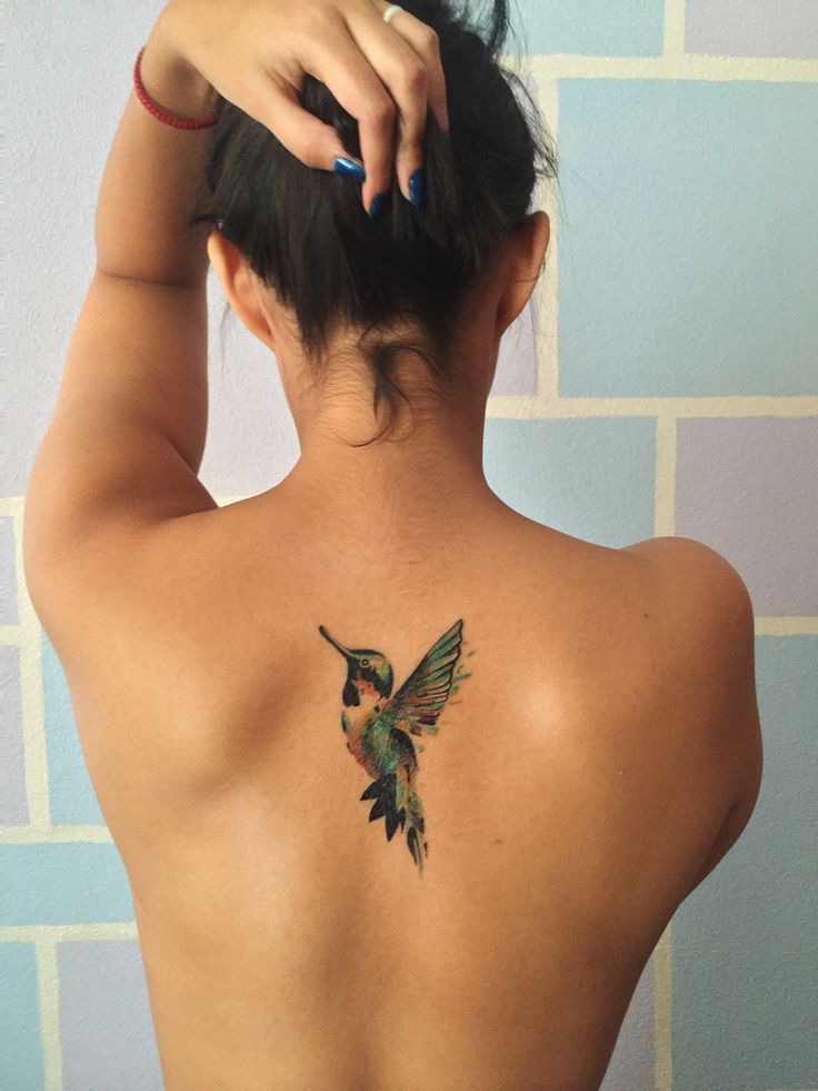 Humming Bird Tattoo On Girls Back