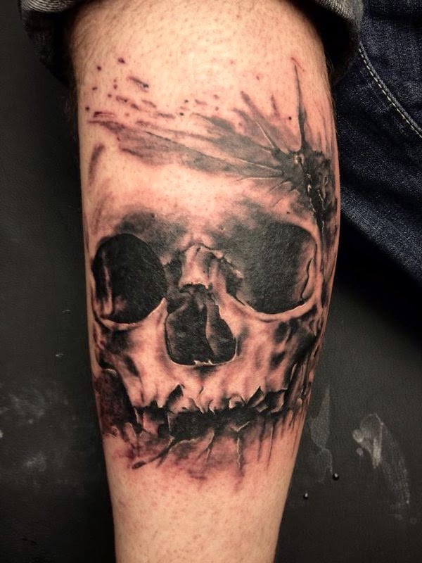 Wounded Skull Tattoo On Leg