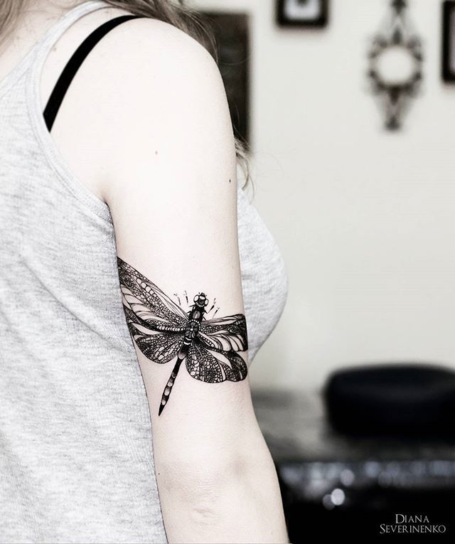 Incredible Black Ink Dragonfly Tattoo on half Sleeve