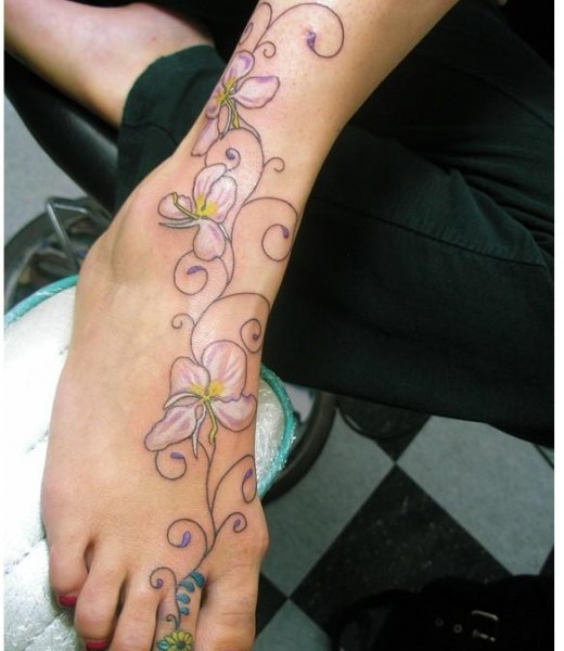 Incredible Orchid Tattoo On Foot And ankle