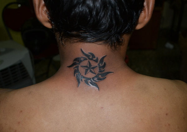 Incredible Tribal Sun Tattoo On Mens Neck back