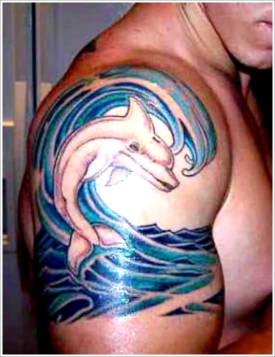 Jumping Dolphin And Water Wave Tattoo On Shoulder