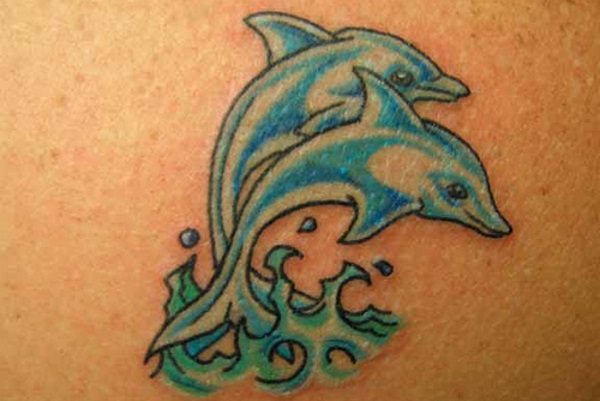 Jumping Dolphin Couple Tattoo Design