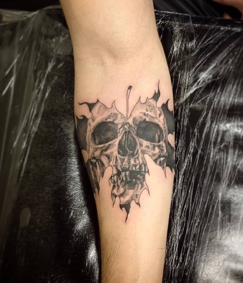 Leaf shaped Skull Tattoo On Forearm