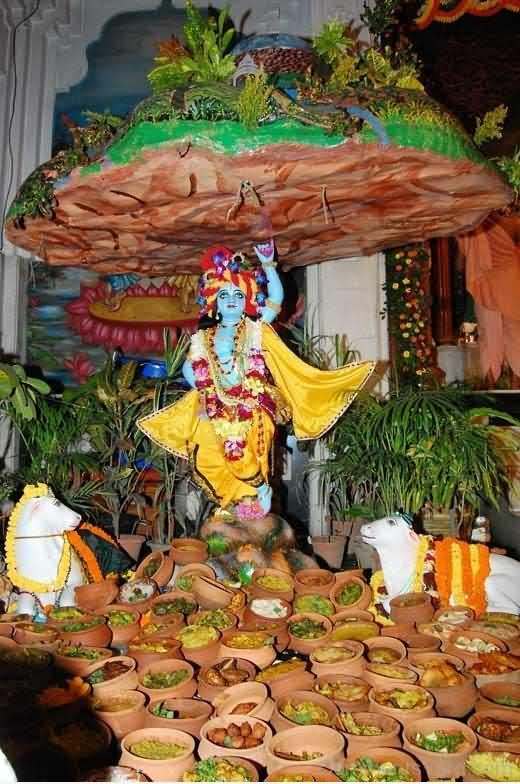 Lord Krishna lifting goverdhan parvat idol