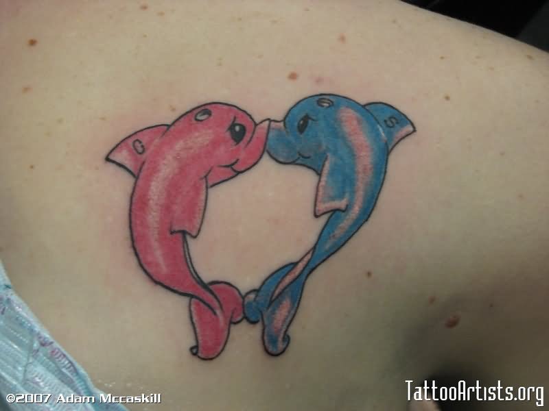 Loving Dolphin Couple Tattoo On Shoulder