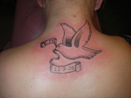 Memorial Dove Tattoo On Back
