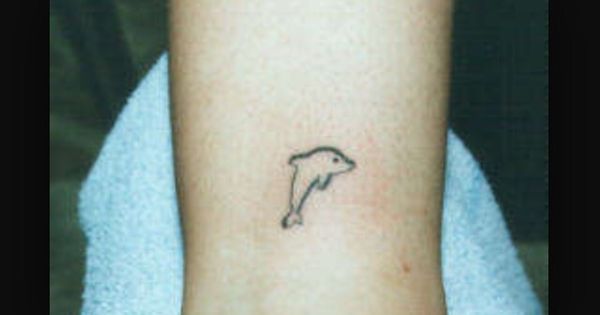 Minimal Dolphin Tattoo on Leg