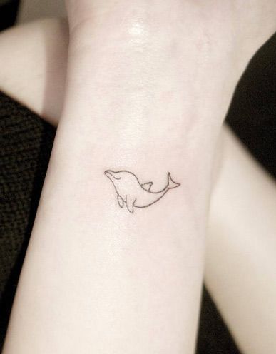 Minimal Small Dolphin Tattoo On Leg