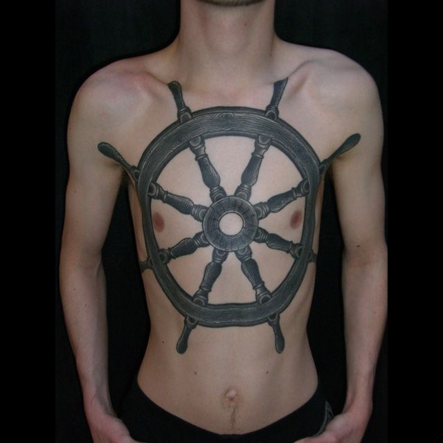 Nautical Wheel Tattoo On chest