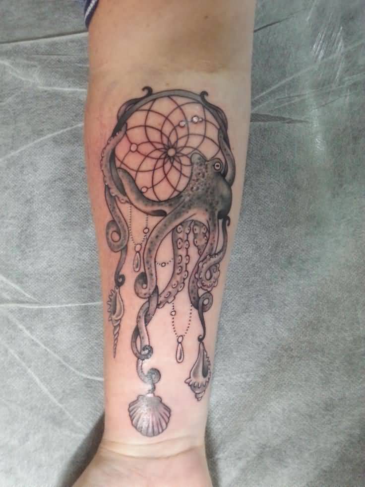 Ocean Themed Octopus Tattoo On Forearm