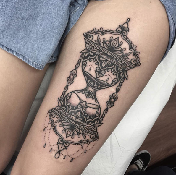 Ornamental Hourglass Tattoo On thigh
