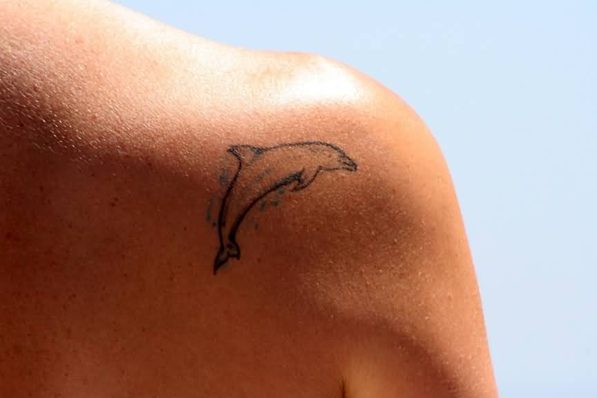 Outline Dolphin Tattoo Design On Back Shoulder