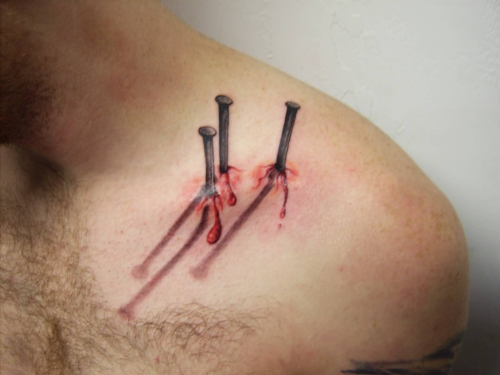 Pierced Nails 3d Tattoo On Collar Bone