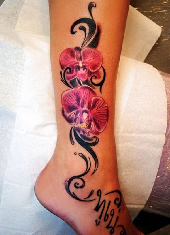 Pink And Black Orchid Flower Tattoo On Leg