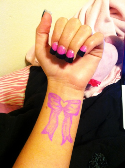 Pink Heart Bow Tattoo On Wrist