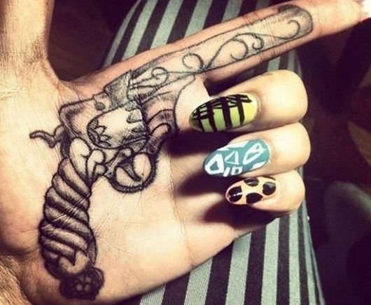 Pistol Tattoo On hand