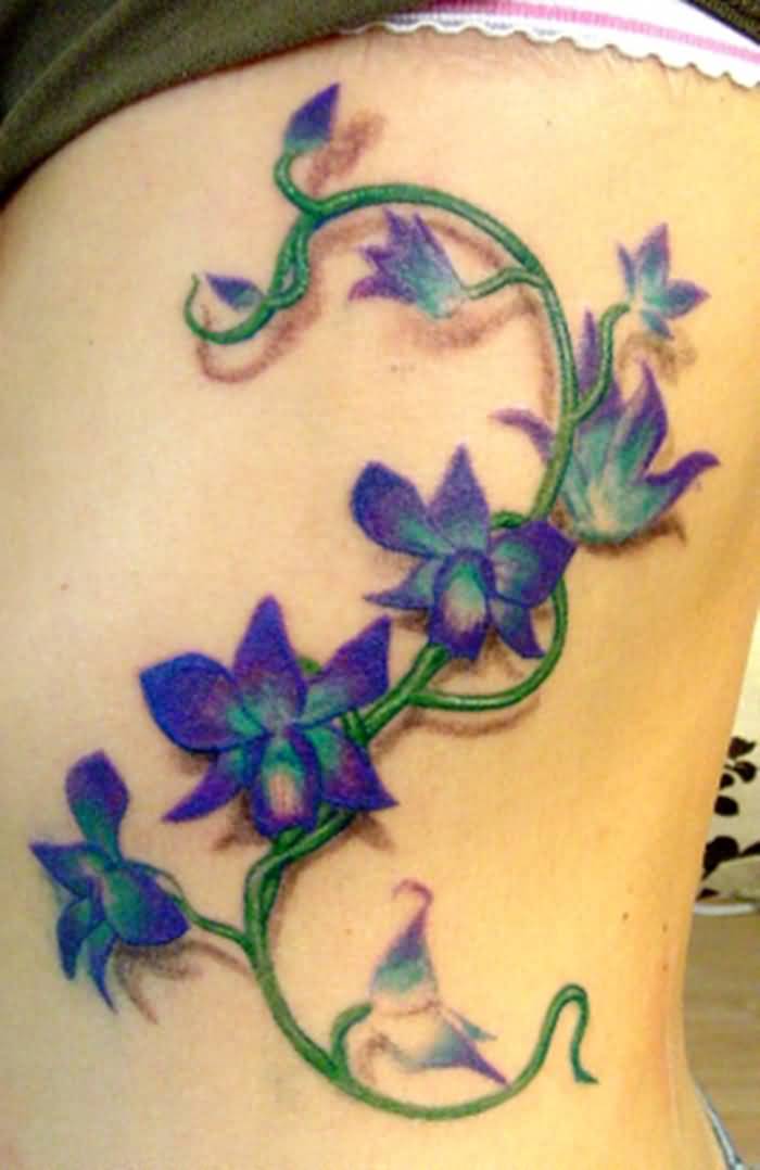 Purple Orchid flower Branch Tattoo On Side Rib