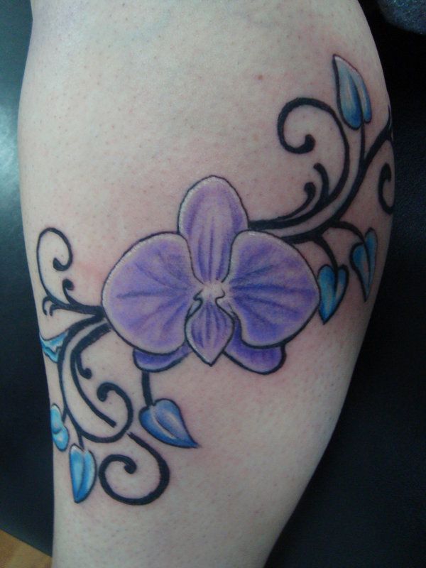 Purple Tribal Orchid Tattoo On Leg