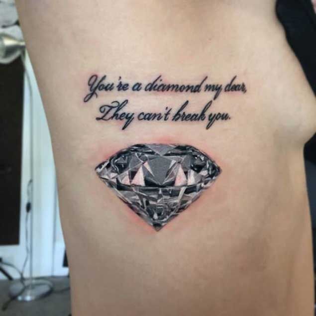 Realistic Diamond Tattoo With Quote On Side Rib