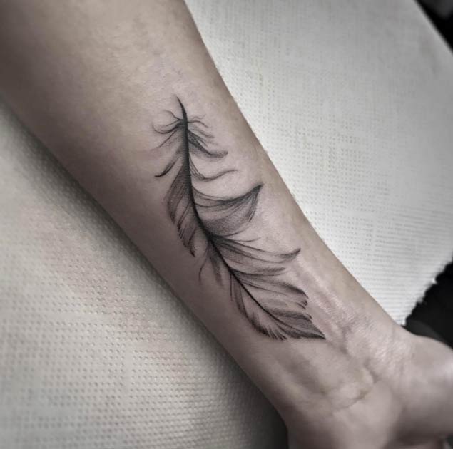 Realistic Feather Tattoo On forearm