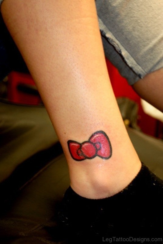 Red Kitty Bow Tattoo On Ankle