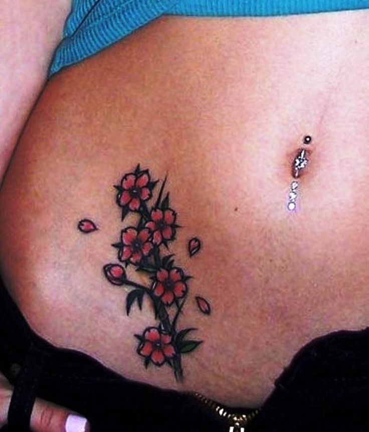 Red Small Orchid Tattoo On Waist