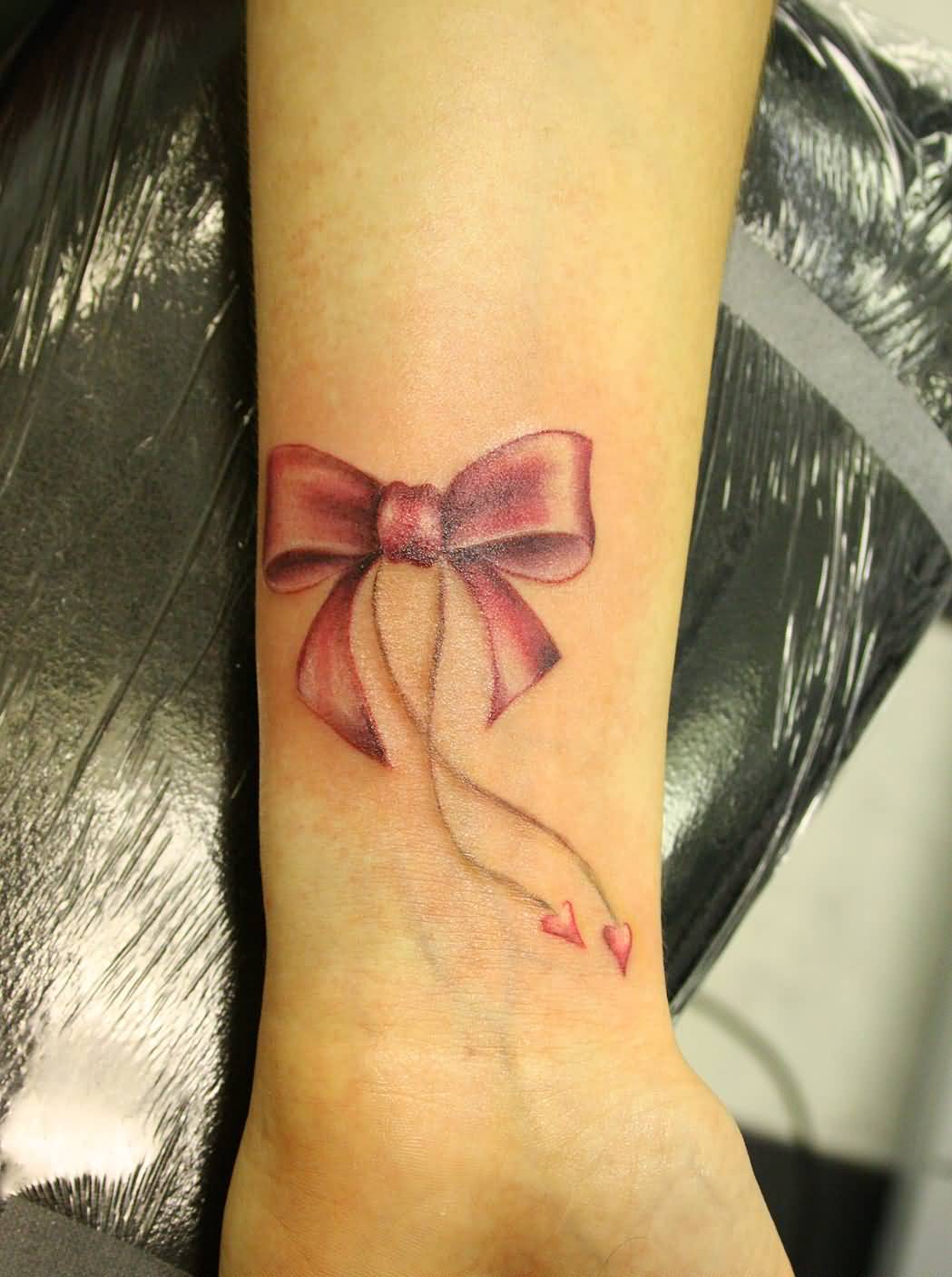 Ribbon Bow Tattoo On Wrist