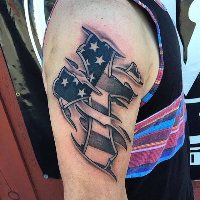 Ripped American Flag And Cross tatoo On half sleeve