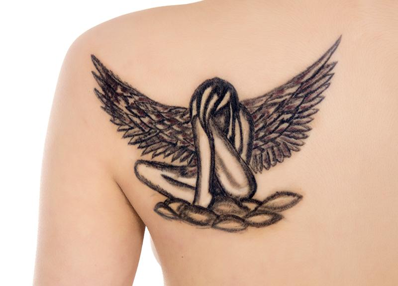 Sad Angel Tattoo On Back Shoulder