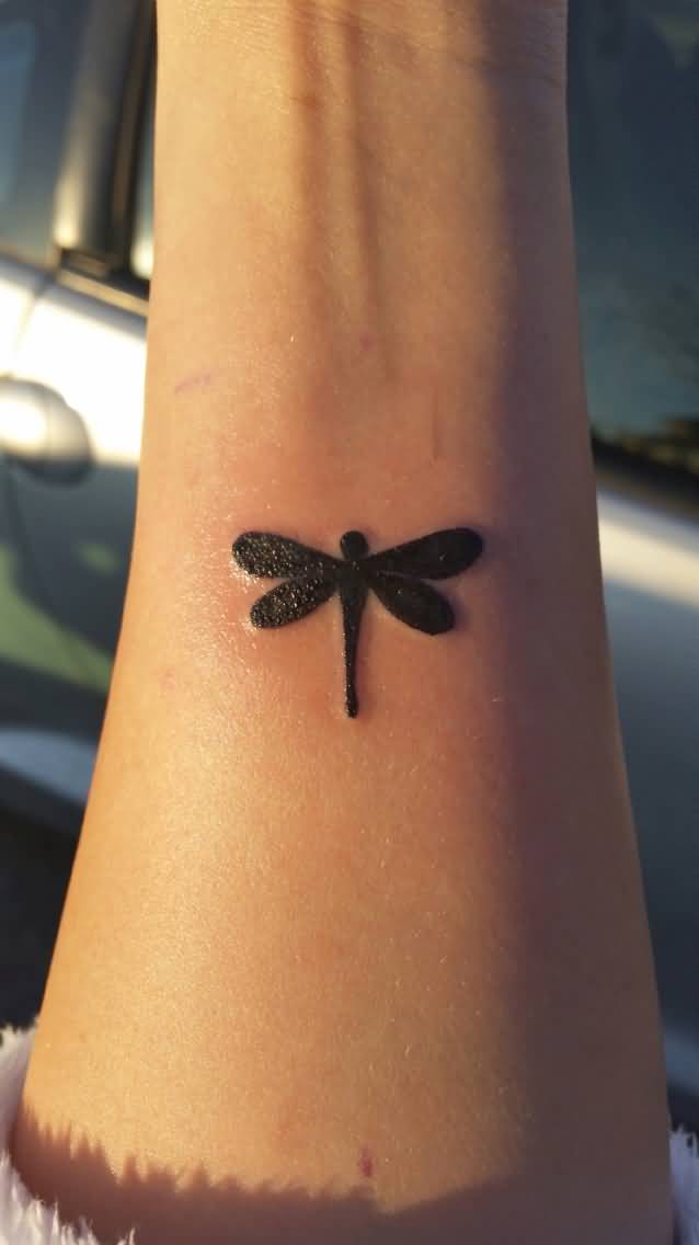 Silhouette Dragonfly Tattoo On Wrist