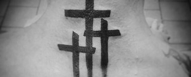 Simple Cross Tattoo On Man back