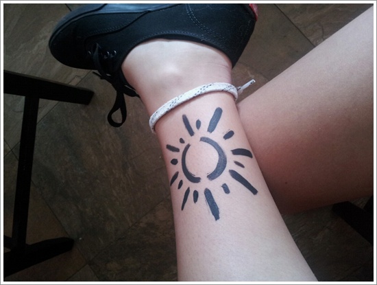 Simple Sun Tattoo Design On Leg Calf