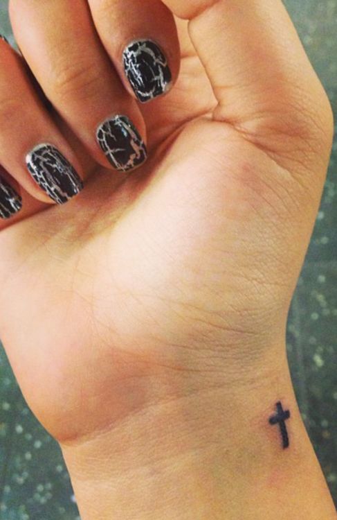Simply tiny Cross Tattoo On Girls Wrist