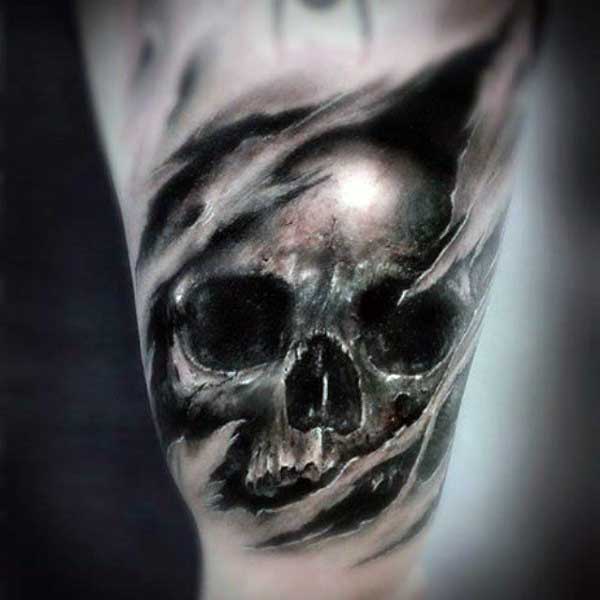 Skull Ripping Through Skinn Tattoo Design