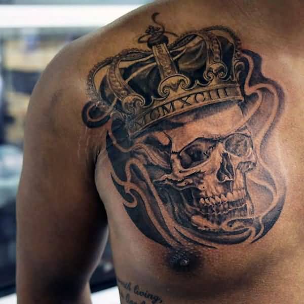 Skull With Crown Tattoo On Chest