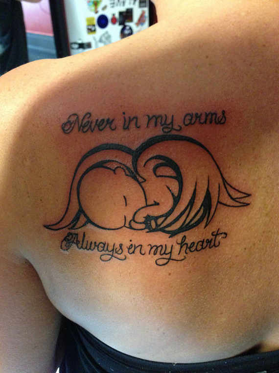 Sleeping baby Angel Tattoo With Quote On Back Shoulder