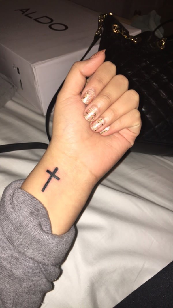 Small Cross Tattoo On Girls Wrist
