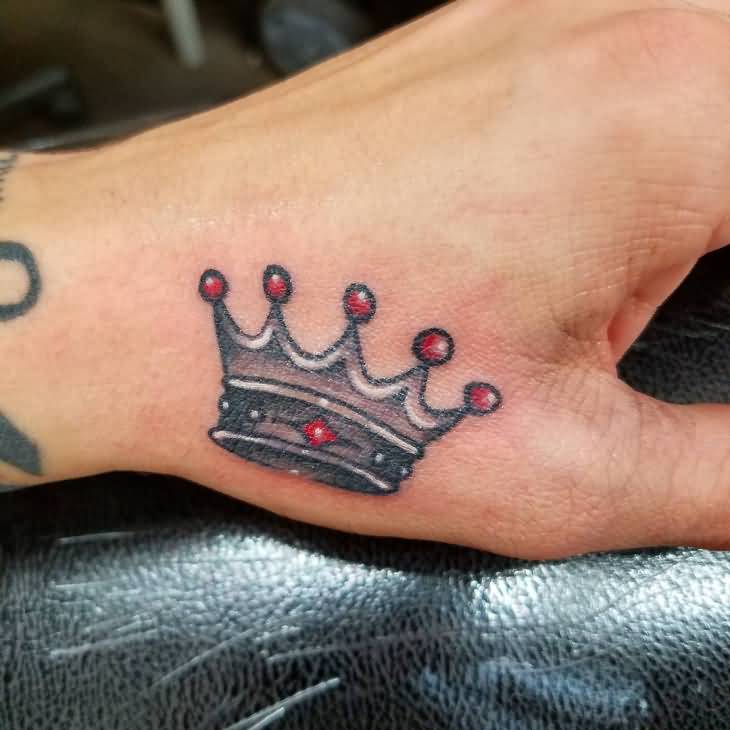 Small Crown Tattoo With Red Pearls On hand