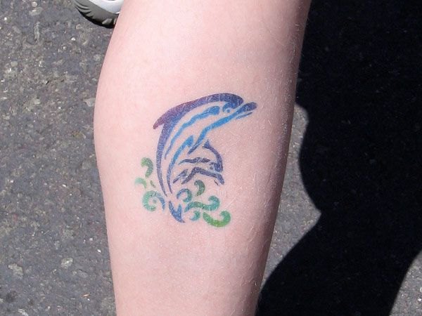 Small Dolphin Tattoo On leg