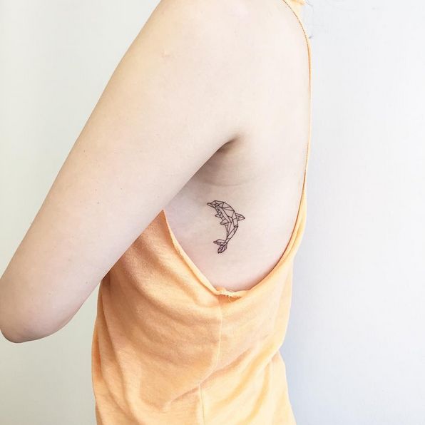 Small Geometric Dolphin Tattoo On Side Rib