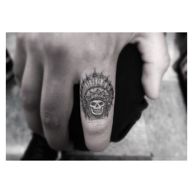 Small Indian Skull Tattoo On Finger