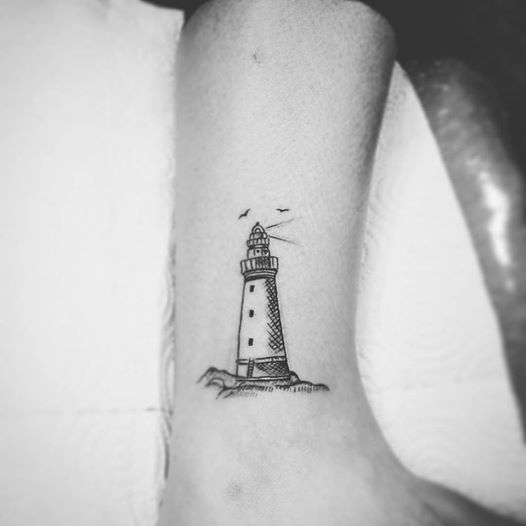 Small Lighthouse Nautical Tattoo