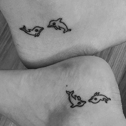 Small Minimal Dolphins Tattoo