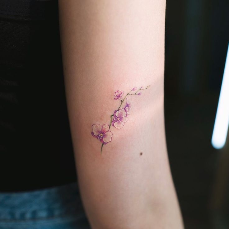 Small Orchid Flower Tattoo Design