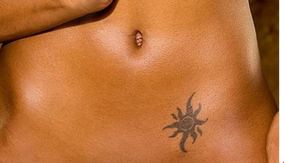 Small Sun Tattoo On Stomach